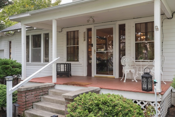 A delightful farmhouse with the original country porch to welcome you.