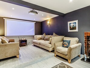 Living room with cinema screen | The Golden Crown, Tarbolton, near Ayr