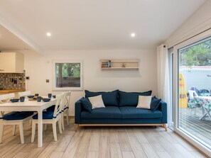 Furniture, Couch, Table, Azure, Wood, Lighting, Interior Design, Rectangle, Living Room, Comfort