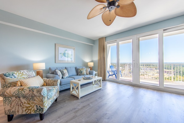 Living room with access to the private balcony.