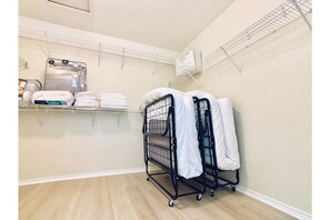 2 rollaway beds in master closet.