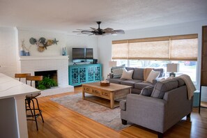 Living Room with TV and Media Cabinet. Lots of board games.