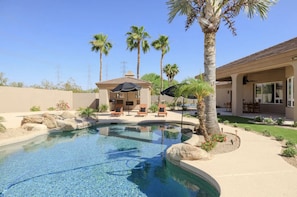 Beautiful pool & outdoor covered BBQ / Fireplace.