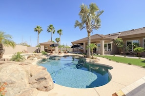 Beautiful pool & outdoor covered BBQ / Fireplace.