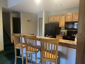 Kitchen with full size appliances and everything you need to whip up a meal.