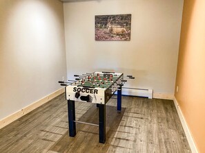 Gather around the foosball table for a fun match or two!