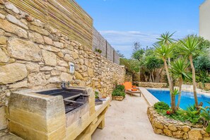 Pool and BBQ area of Gozo holiday home