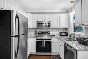 Kitchen equipped with all your cooking supplies.