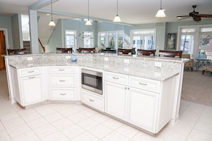 Kitchen island with drawer microwave