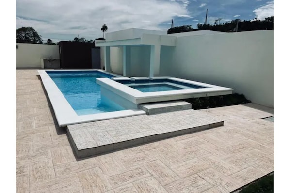 Private pool with kiddie pool.