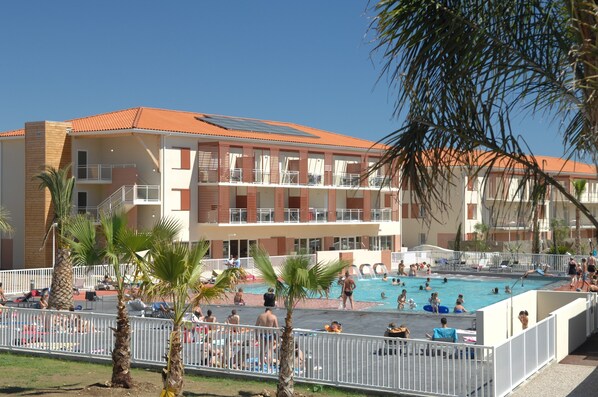 Spend time with family and friends in the outdoor pool during the summer.