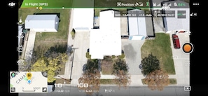 Aerial view showing two driveways for vehicles, boats, trailers, etc.