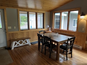 Extra dining space in the sun room seats 6+