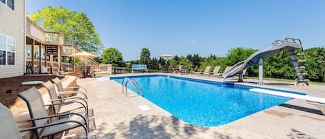 The in-ground pool is the perfect place to cool off in the hot TN summer. The diving board and slide make it extra fun!