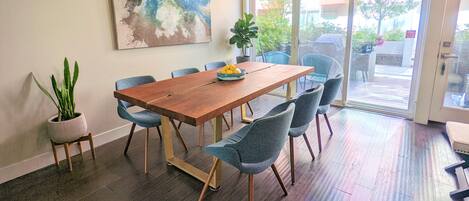 Dinning area with slide door to front porch with bbq gill.