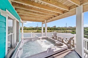 A spacious six-person hot tub, thoughtfully designed for the ultimate relaxation experience.