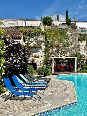 Pool loungers and covered deck