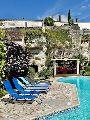 Pool loungers and covered deck