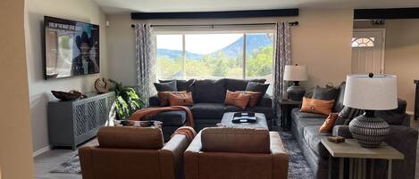 Large picture window in the great room with view of the mesas. 72" streaming TV