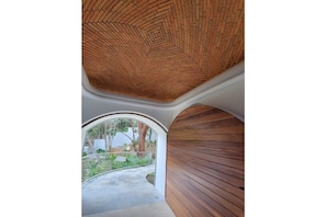 Boveda ceiling in entry with 8 foot wide front door.