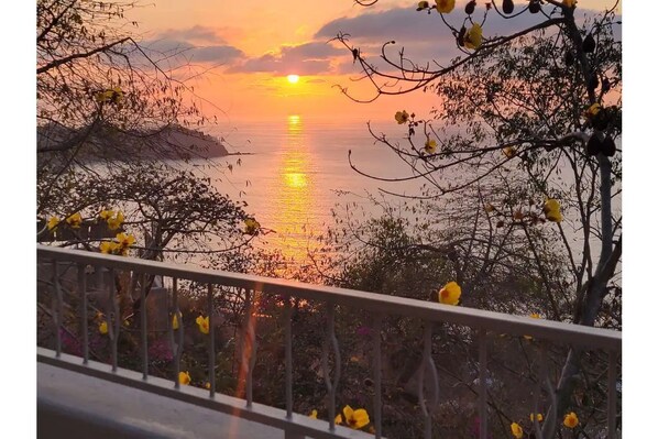 Pacific sunset from your master balcony.