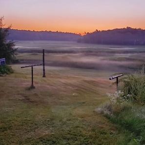 Sunrise and the early morning mist.