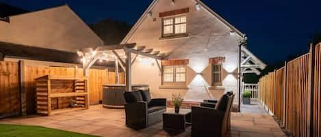 The private garden at night at Pilgrim Cottage, Cheshire