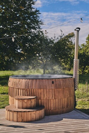 The wood-fired hot tub at Orchard Snug, Somerset