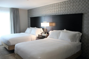 Get a good night's rest in the cozy bedroom.