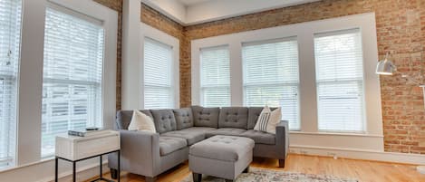 Comfortable and bright living room, you can even see main street from the windows.