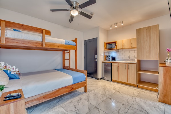 Queen size lower bed and single size top bed