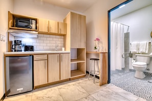 Kitchenette with mini fridge, microwave, closeth with safe