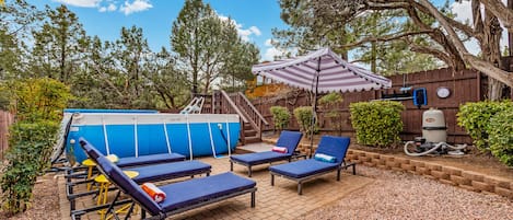 Our shaded pool area is ready for you! Floaties, loungers, shade - check!