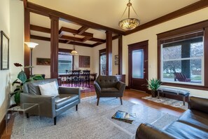 True craftsmanship in this box beam ceiling. Enjoy relaxing in the living room.