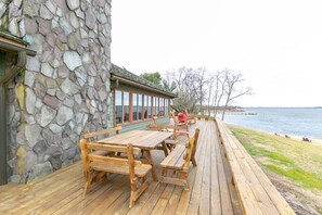 Head out to relax and enjoy the serene setting on the furnished back deck.