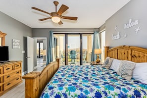 Primary bedroom king bed with gulf view and access to patio