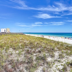 White sand beach on gulf of mexico steps from the condo!