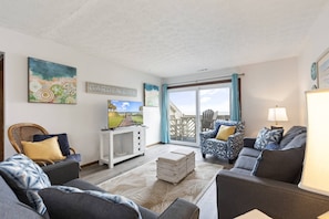 Living Area with Ocean Views and Access to Deck