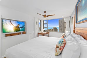 Bedroom with king size bed, TV, ceiling fan and Ocean view