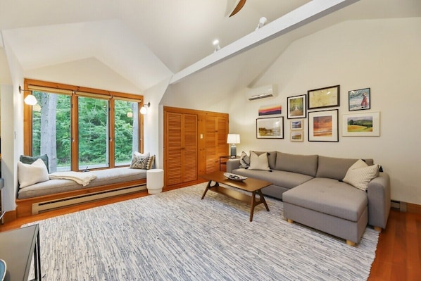 Great room with pullout sofa- queen bed, sleeps 2. Please note: must climb stairs to access this space