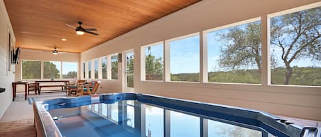 Large swim spa in the screen porch.