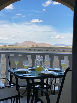 Balcony area to escape the afternoon sun and enjoy a spot if lunch .