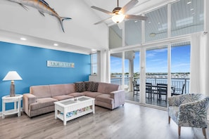 Spacious Living room with large TV and water views