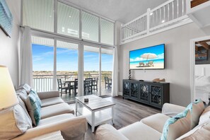 1st floor living area with balcony access; Loft Above