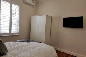 Air-Conditioned Bedroom with 1 queen-sized bed with linen
