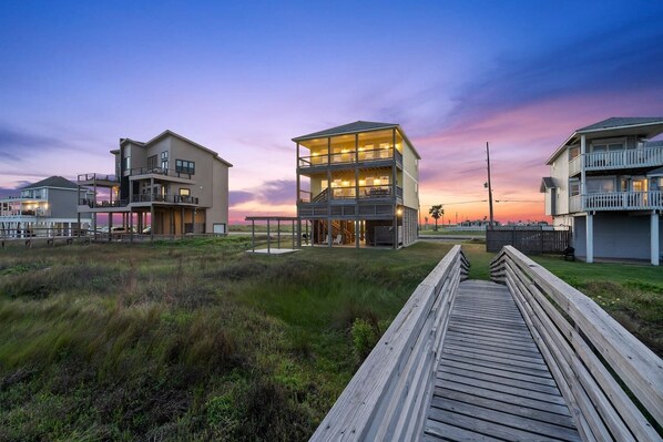 This home has panoramic, unobstructed views of the Gulf of Mexico and the beach is steps away via the private dune walkover.