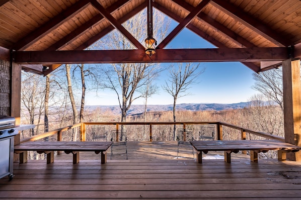 Scenic mountain deck with panoramic views, vaulted ceiling, and stainless grill.