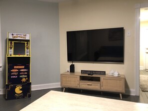 65” smart TV & PacMan arcade game to keep busy on rainy days or every day!