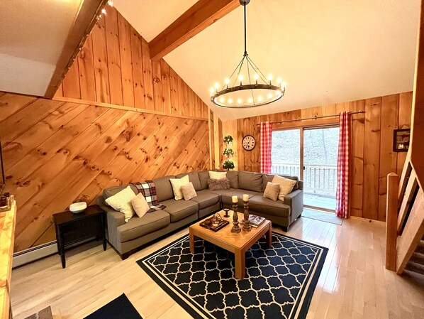 Moose House Great Room with soaring ceilings and beautiful view of the mountain.
