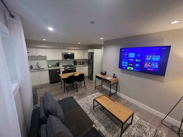Living room with 65" smart TV 

